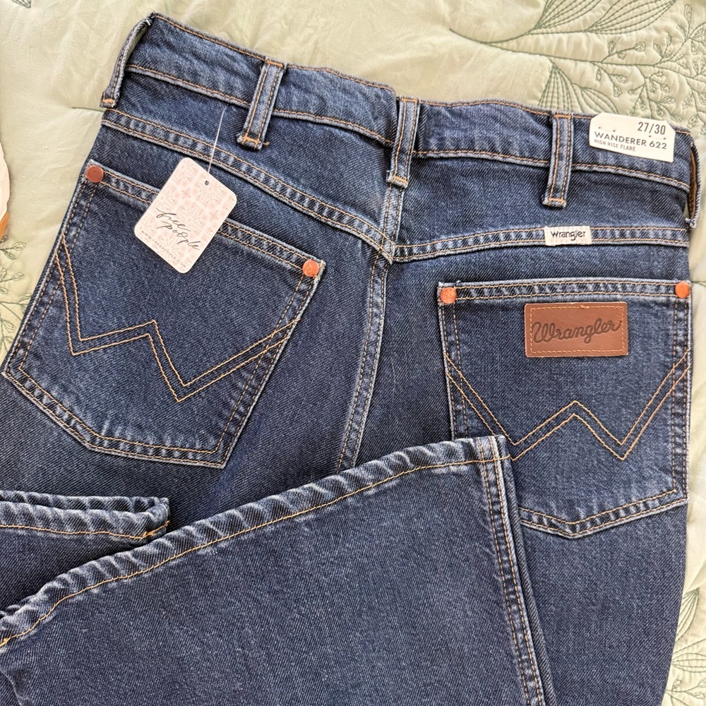 The Wanderer Wrangler High Rise Jeans with Signature Stitching by Free People